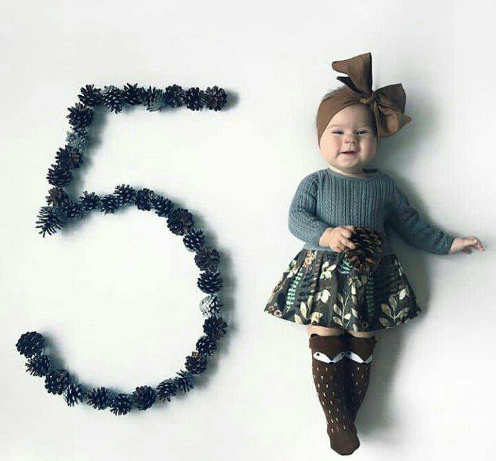 أفكار جلسات تصوير للطفل بالصور ووضعيات تصوير الأطفال حديثي